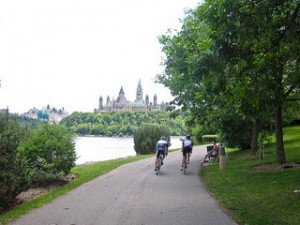 Cyclists approaching Parliament Hill in Ottawa